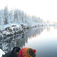 Phil pre-breather sin Sentinel i minus 10 grader inden et dyk i en finsk sø. Phil Short – hulemand om en hals